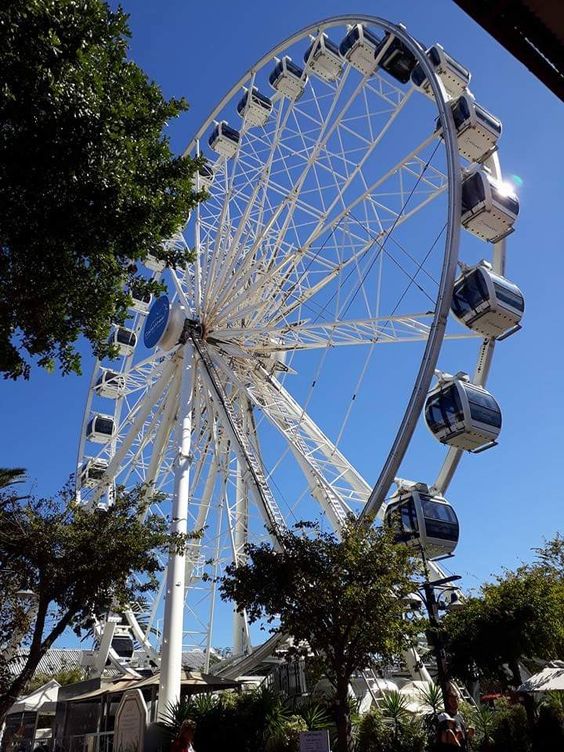 Cape Wheel at the V and A Waterfront under a clear blue sky